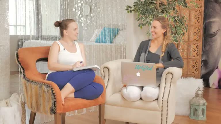 Brett Larkin leading an advanced yoga training session with students